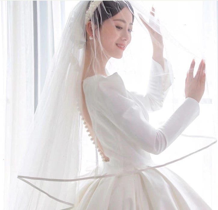 Tu Linh Boutique áo cưới Áo Cưới Tay Dài Cổ V